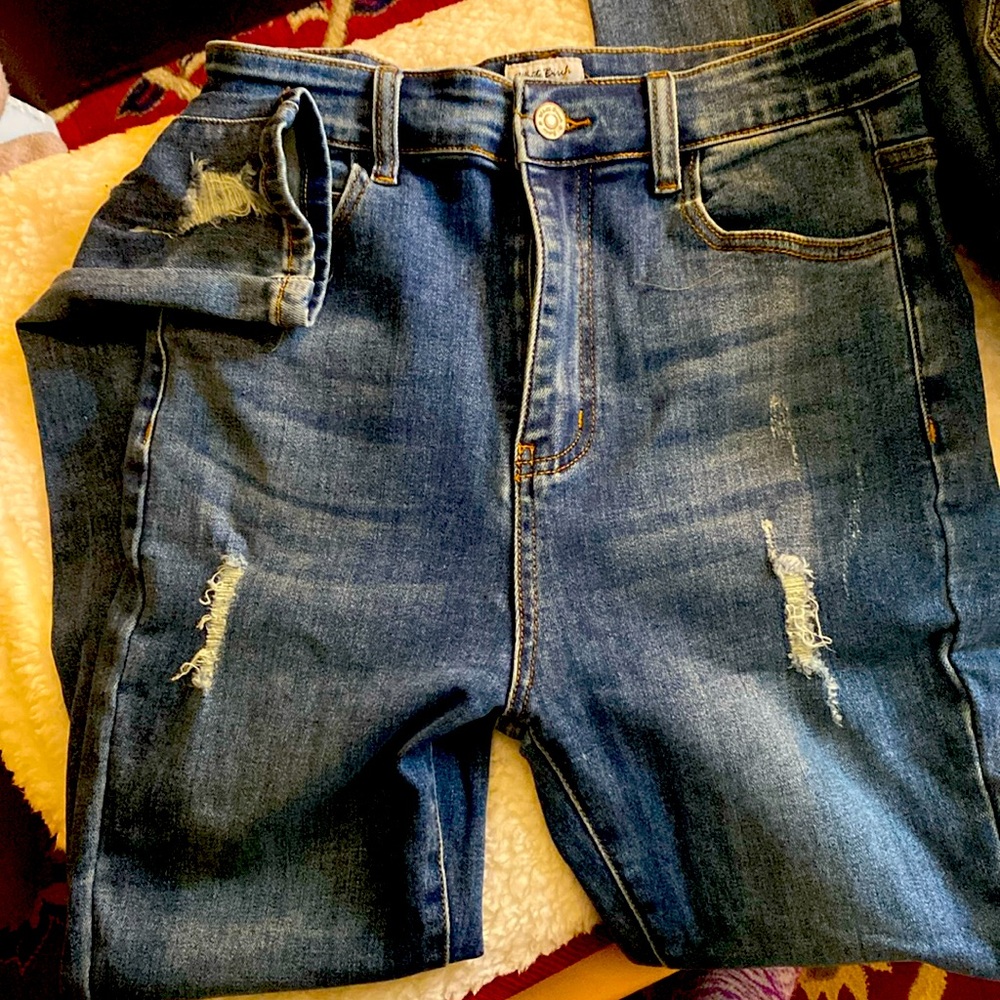 White birch jeans. Distressed on legs and bottom